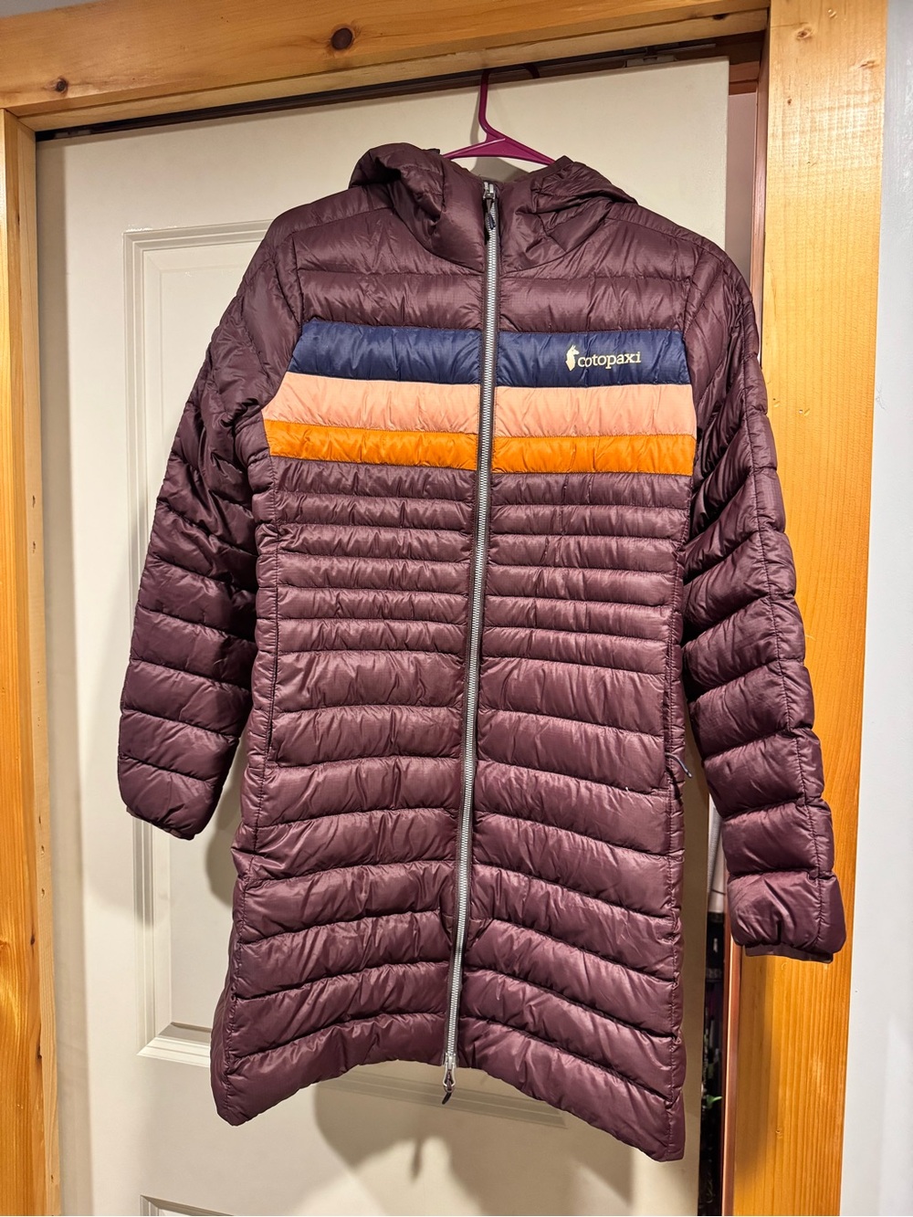 Cotopaxi Womens Fuego Down Hooded  Puffer with Navy, Peach & Orange Stripes